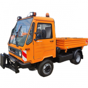 Multicar M26.1 Standard Line in Orange vor einer Werkhalle – vielseitiger Klassiker für den kommunalen Einsatz. M26.1 - VW 5-Gang